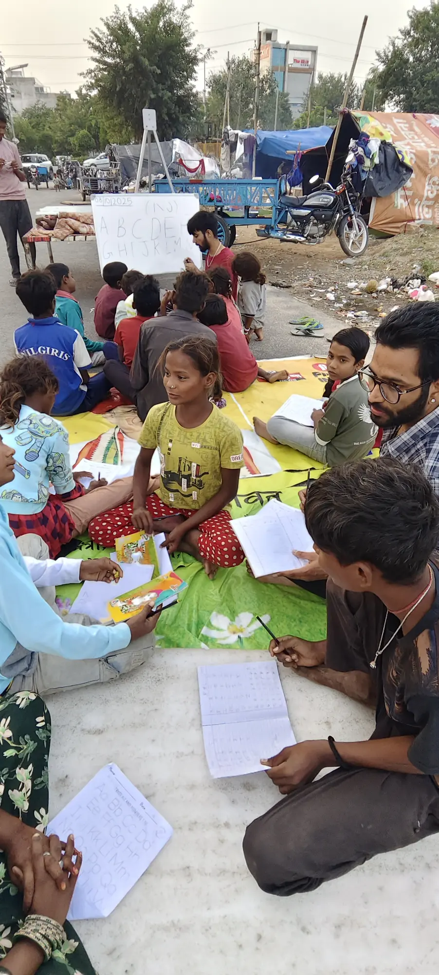 A classroom can begin wherever children gather. field image from Shiksha Kala Foundation.
