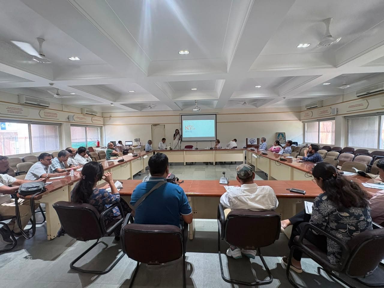A speaker presenting to attendees during the YouthPOWER handbook launch in Jaipur.